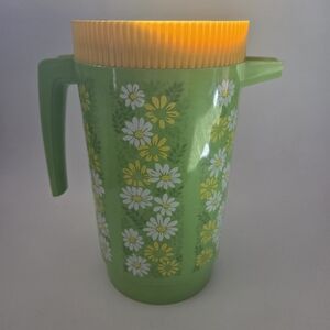 Plastic Green Floral Pitcher with Yellow Lid